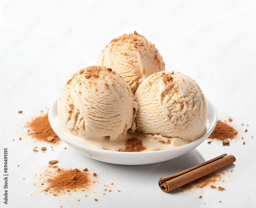Vanilla ice cream scooped and cinnamon