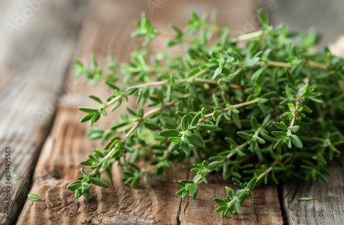 Fresh Thyme Sprigs on Wooden Table