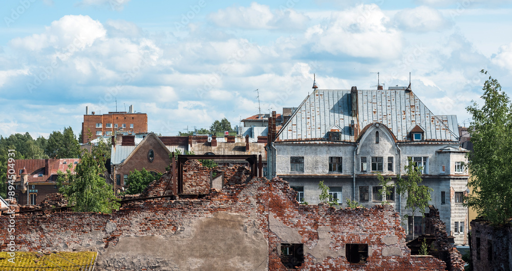 Obraz premium cityscape, urban skyline, view of the roofs of old houses