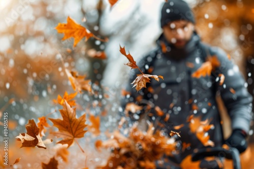 Man Blowing Leaves in Fall