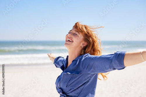 Beautiful woman enjoying sun at tropical beach with copy space