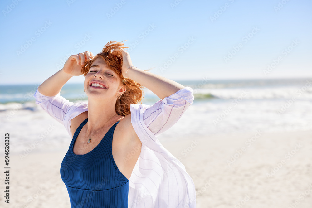 Portrait of cheerful young woman in swimsuit at beach Portrait of cheerful young woman in swimsuit at beach