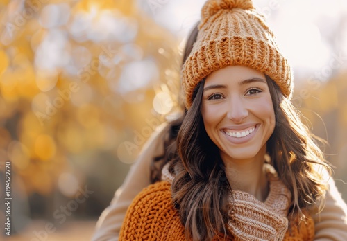 Woman Smiling in Orange Knit Hat During Fall