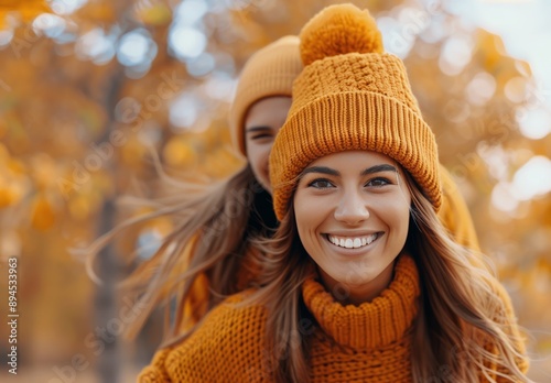 Woman Smiling in Orange Knit Hat During Fall