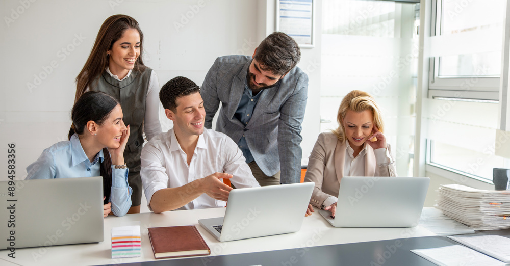 Business people working together on new project in modern office. Business people working together on new project in modern office.