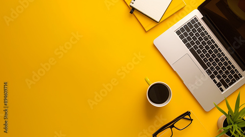 Top view office desk with laptop, notebooks and coffee cup