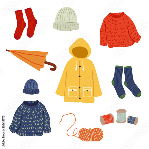 Autumn set of vector hand-drawn icons. Autumn cozy sticker. Set of autumn forest plants, forest animals, autumn products and food, knitted sweaters, raincoat and umbrella