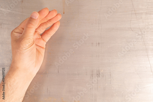 A hand outstretched against...