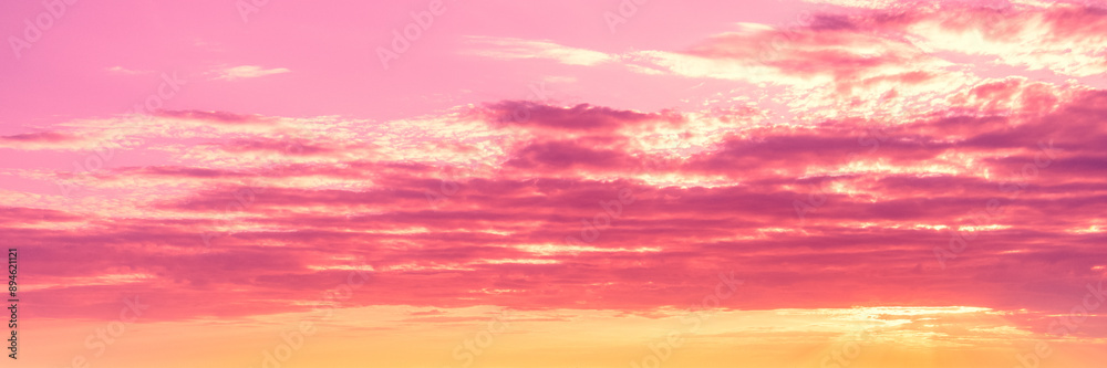 Fototapeta premium Colorful cloudy sky at sunset. Gradient color. Sky texture. Abstract nature background Horizontal banner