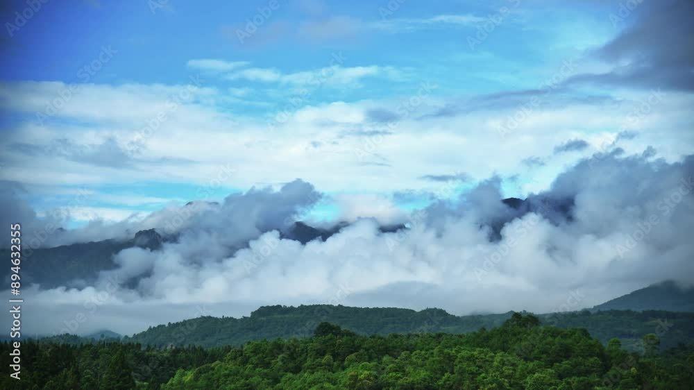 Time lapse of mountains covered fog in summer Time lapse of mountains covered fog in summer