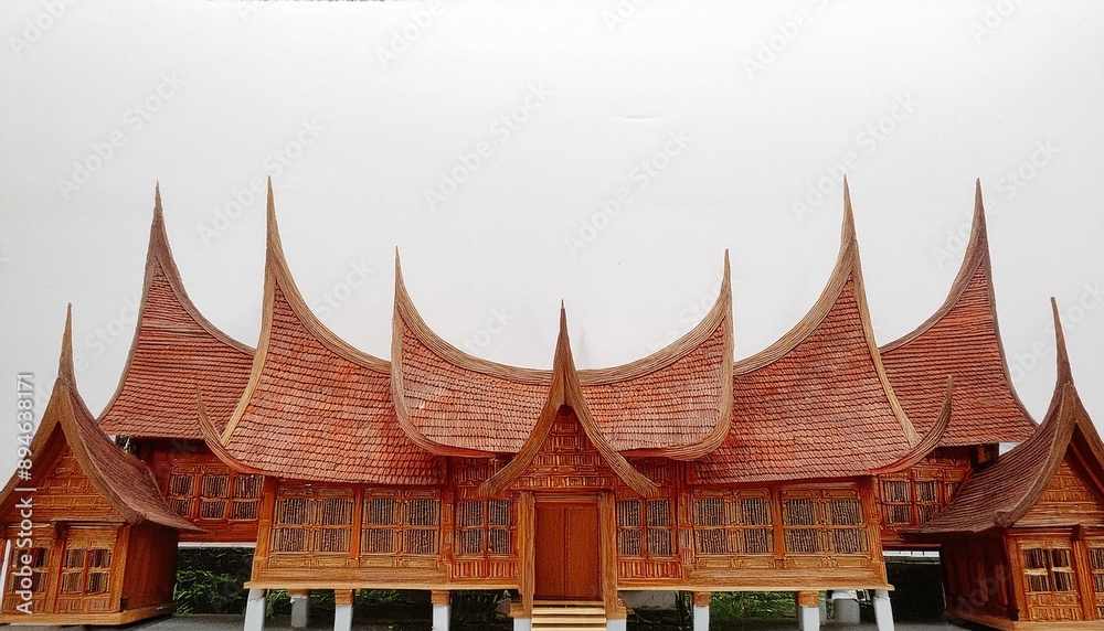 Fototapeta premium Miniature of Traditional Minangkabau House from Indonesia – Isolated on White Background
