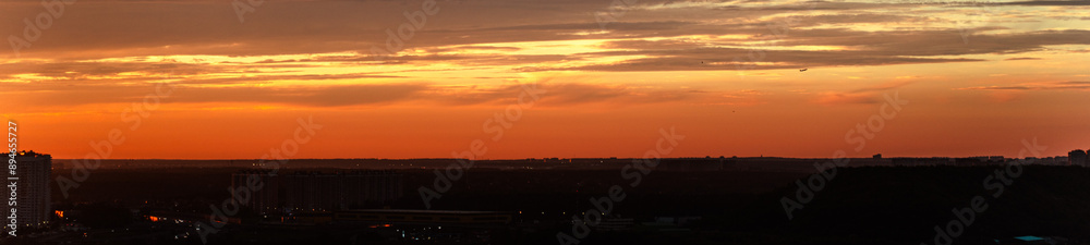 Panorama of a big city at dusk at sunset. Panorama of a big city at dusk at sunset.