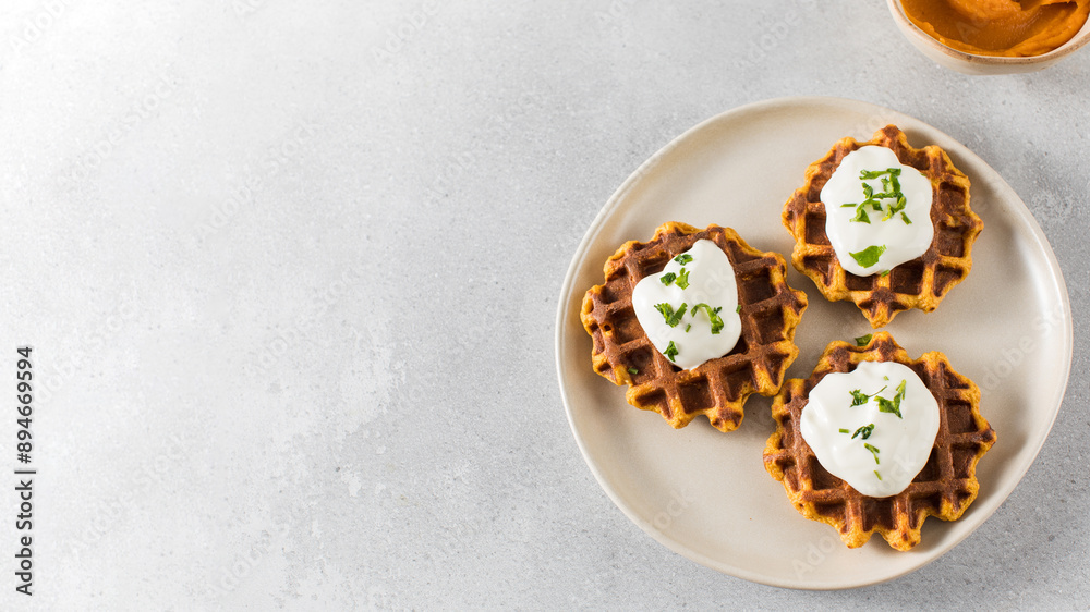Vegetarian sweet potato waffles with natural yogurt. Healthy food. Copy space Vegetarian sweet potato waffles with natural yogurt. Healthy food. Copy space