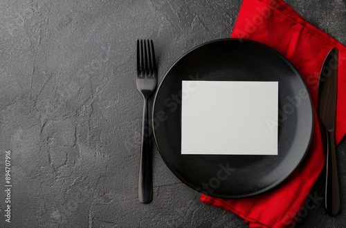 Black Plate and Forks on Gray Surface