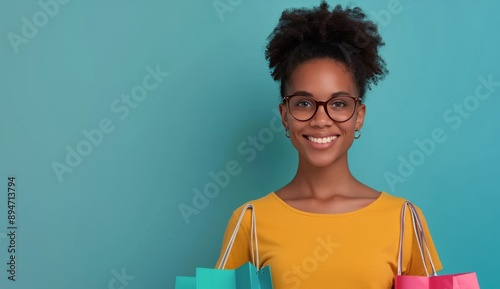 Woman in Sunglasses Holding Shopping Bags