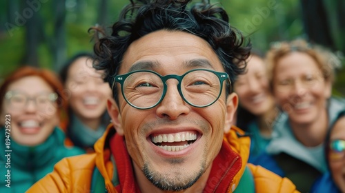 A Diverse Group Of Mid-Adult Asian Friends, Laughing And Chatting While Eagerly Waiting