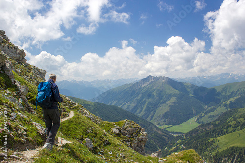 Man hiking in the High Tauern National Park, the Austrian Alps