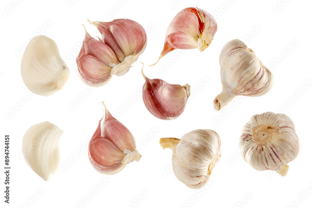 White background with isolated cut out garlic and garlic bulbs. Vegetables food product for montage. White background with isolated cut out garlic and garlic bulbs. Vegetables food product for montage.