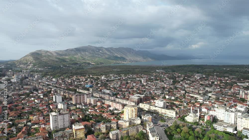 Skadar historical city with surrounding mountains and Skadar lake,Shkoder,Albania,Balkan,Europe,aerial panorama landscape view, cityscape