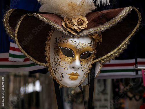 Venetian Colorful Carnival mask hanging from street market photo