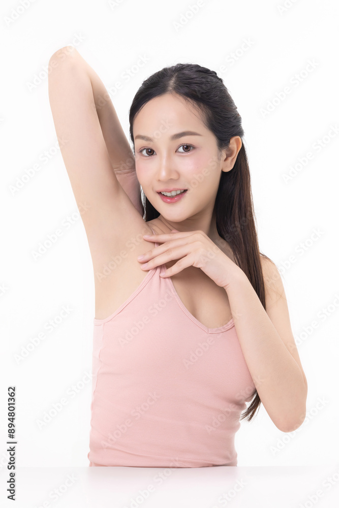 Beautiful young Asian woman lifting hand up to shows off clean and clear armpit or underarms isolated on white background, Smooth and freshness armpit concept. Beautiful young Asian woman lifting hand up to shows off clean and clear armpit or underarms isolated on white background, Smooth and freshness armpit concept.