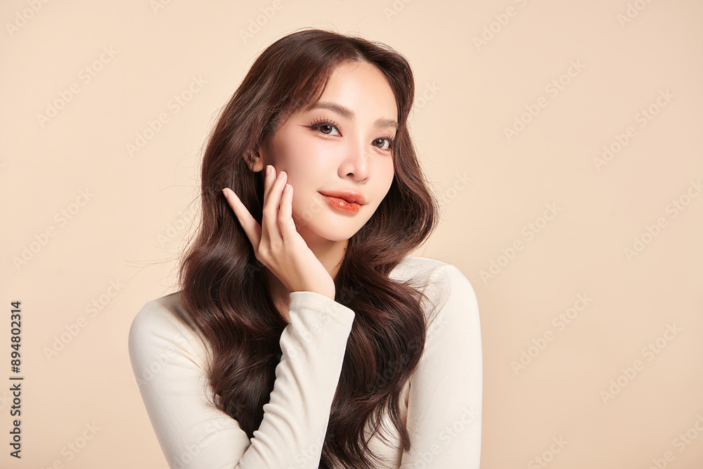Beautiful young asian woman with clean fresh skin on beige background, Face care, Facial treatment, Cosmetology, beauty and spa, Asian women portrait. Beautiful young asian woman with clean fresh skin on beige background, Face care, Facial treatment, Cosmetology, beauty and spa, Asian women portrait.