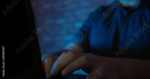Man Using A Notebook In The Dark