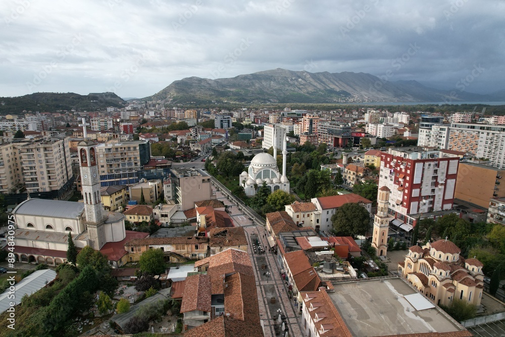Fototapeta premium Skadar historical city with surrounding mountains and Skadar lake,Shkoder,Albania,Balkan,Europe,aerial panorama landscape view, cityscape