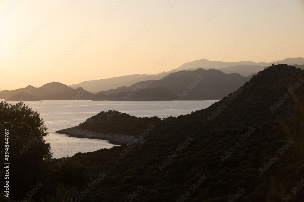 Sunset in the mountains with olive groves over the Mediterranean sea Sunset in the mountains with olive groves over the Mediterranean sea