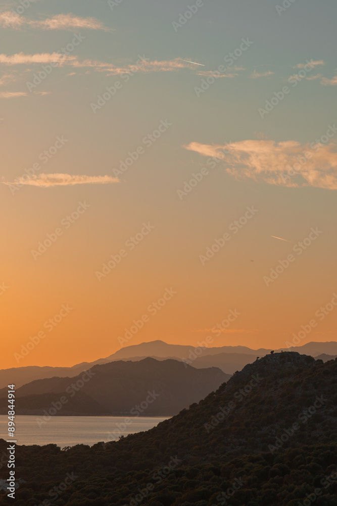 Sunset in the mountains with olive groves over the Mediterranean sea Sunset in the mountains with olive groves over the Mediterranean sea