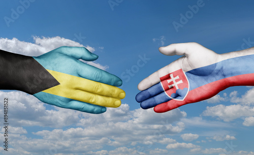Canvas Print Slovak Republic or Slovakia and Bahamas country handshaking with flags, consensu