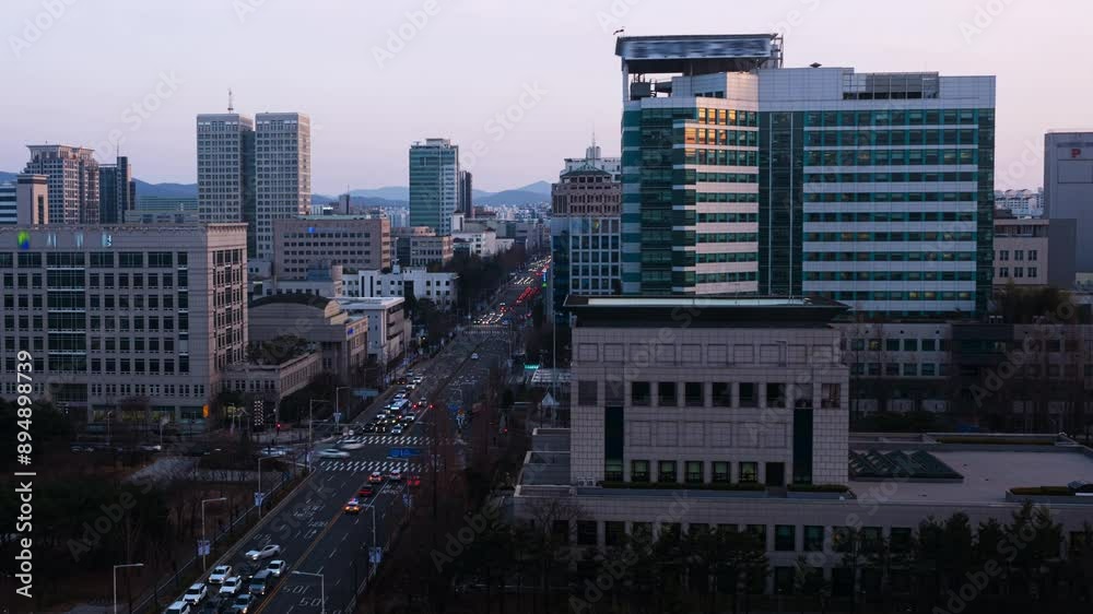 DAEJEON, SOUTH KOREA. Aerial view of skyscrapers in Daejeon, South Korea during a sunset, from day to шпре time-lapse
