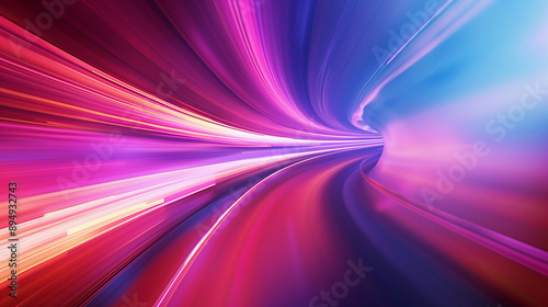 Abstract colorful light trails in motion on a tunnel-like background.