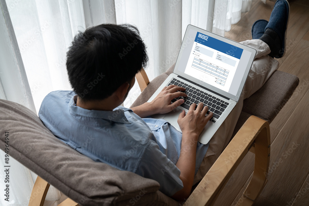 Invoice on computer screen from accounting application. Computer program for financial and budget of corporate business. Snugly. Invoice on computer screen from accounting application. Computer program for financial and budget of corporate business. Snugly.
