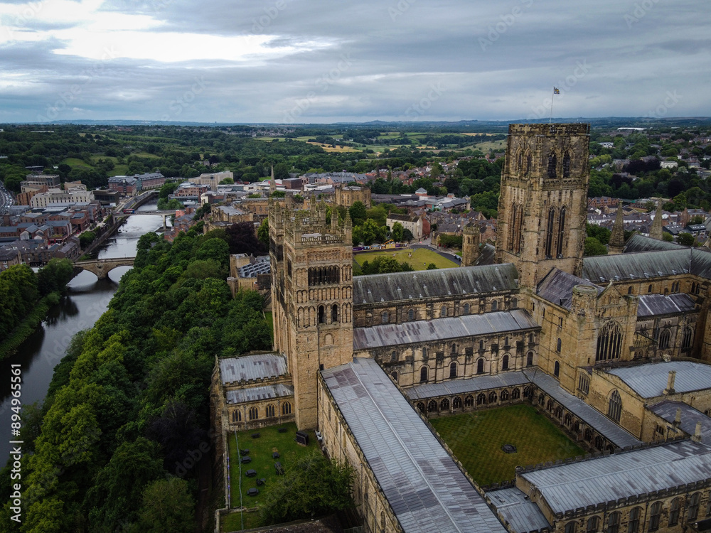 Fototapeta premium Durham Cathedral scenic aerial view by cloudy noon, England