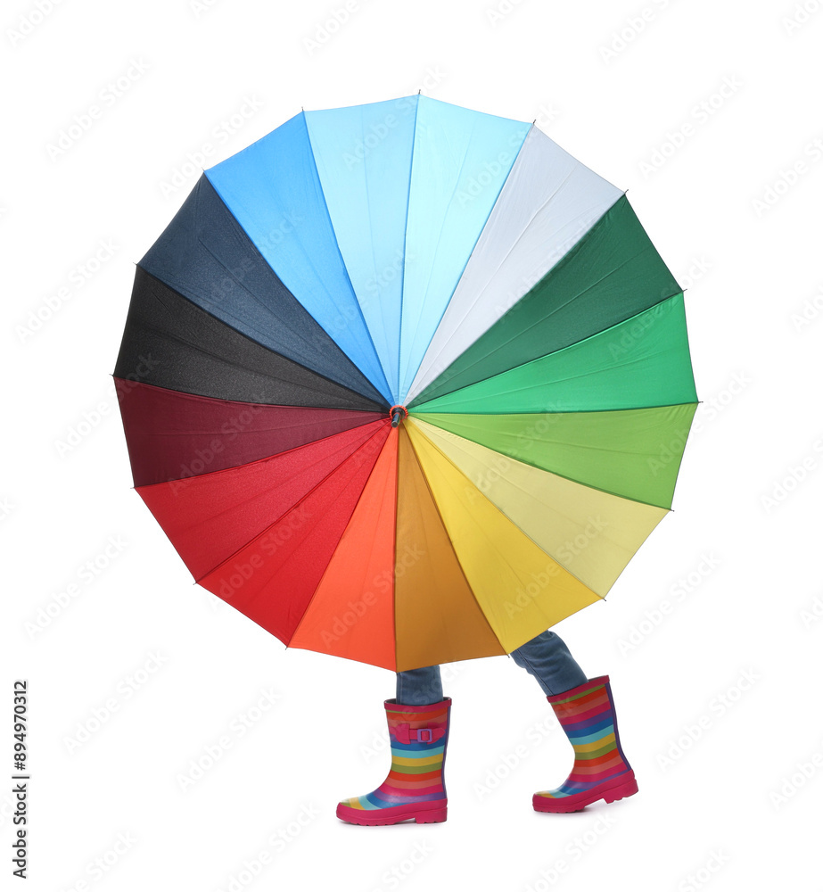Obraz premium Little girl with colorful umbrella on white background