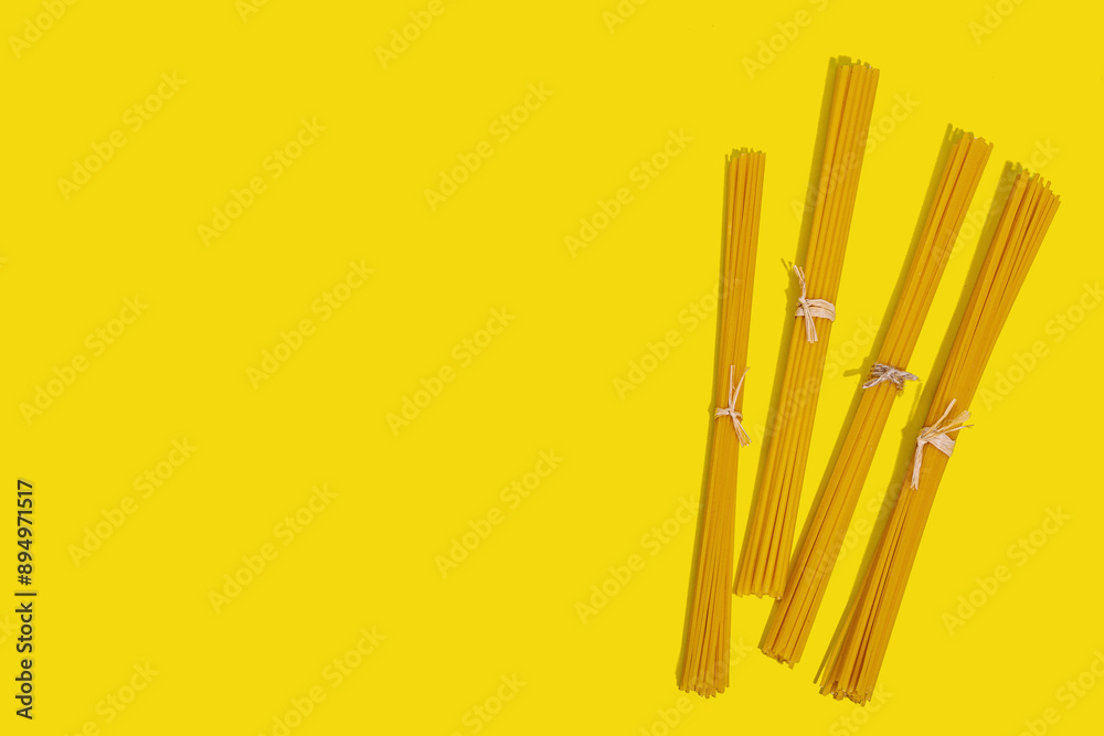 Pasta. Various kinds of uncooked pasta and noodles over wooden background Pasta. Various kinds of uncooked pasta and noodles over wooden background