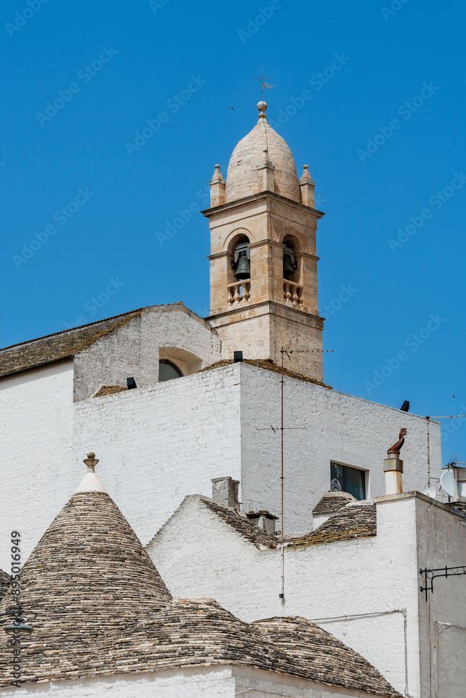 Trulli of Alberobello with Chiesetta Rettoria SS. Sacramento and S.Lucia, a UNESCO heritage site. Trulli of Alberobello with Chiesetta Rettoria SS. Sacramento and S.Lucia, a UNESCO heritage site.