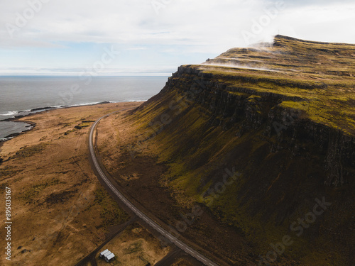 The Ring Road in Iceland stretching beyond the coastline photo