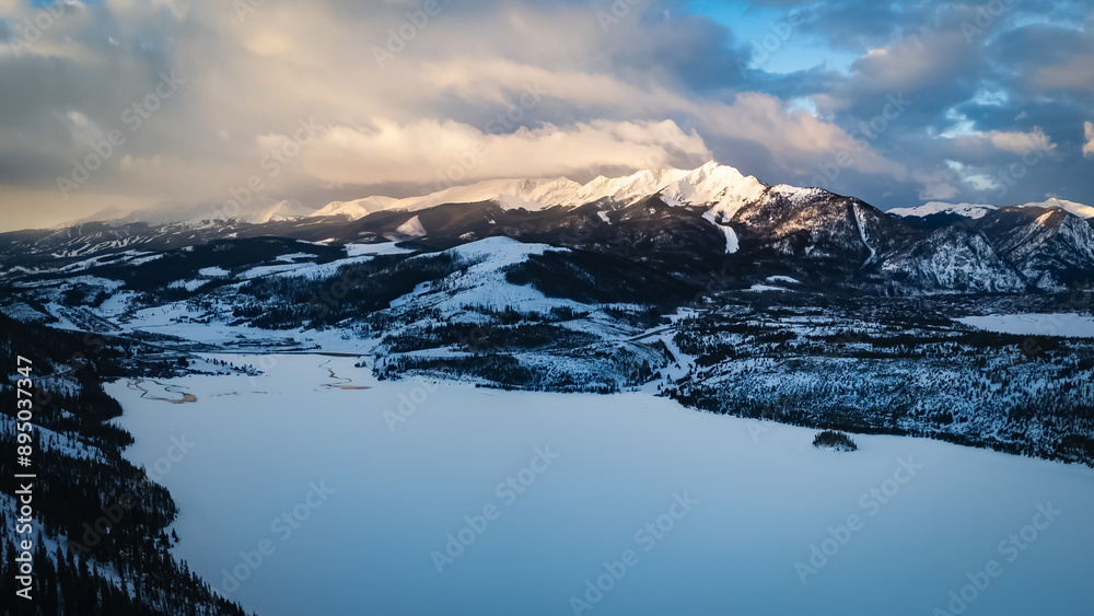 Snow-covered mountain range at sunrise in Dillon, Colorado Snow-covered mountain range at sunrise in Dillon, Colorado
