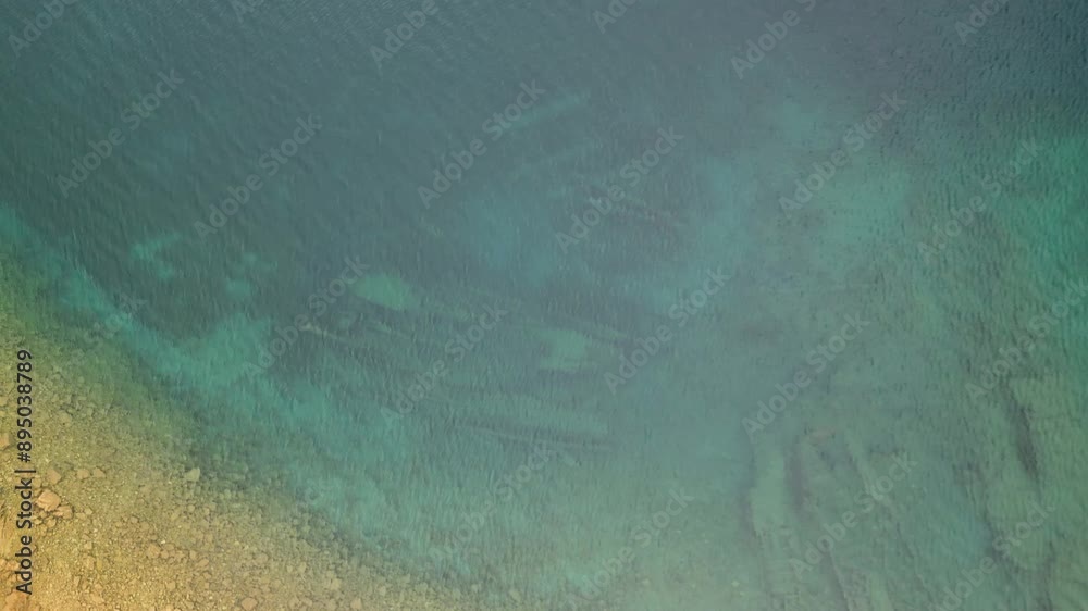 Aerial topdown ascent of The Tugs Shipwrecks in Fathom Five National Park, Tobermory, Ontario, Canada Aerial topdown ascent of The Tugs Shipwrecks in Fathom Five National Park, Tobermory, Ontario, Canada