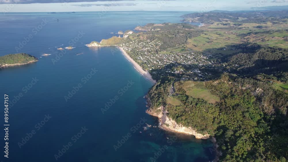 Cathedral Cove Viewing Deck With Hahei Beach Resort Town On Coromandel Peninsula, North Island, New Zealand. Aerial Shot Cathedral Cove Viewing Deck With Hahei Beach Resort Town On Coromandel Peninsula, North Island, New Zealand. Aerial Shot