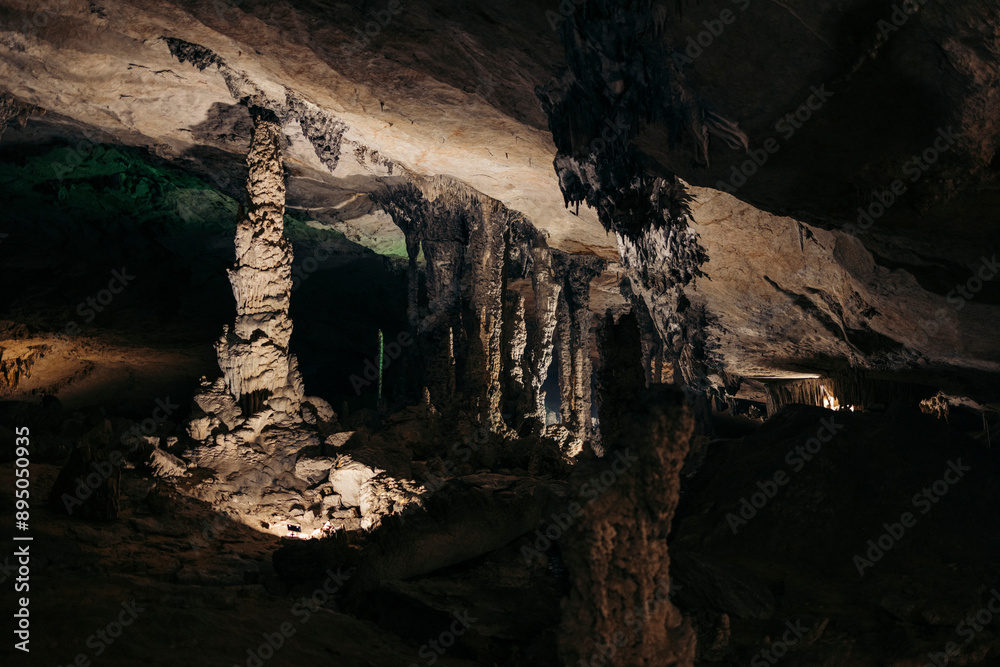 Lights illuminate the dark Kong Lor Cave in Phu Hin Bun National Park, Laos; Khammouane Province, Laos