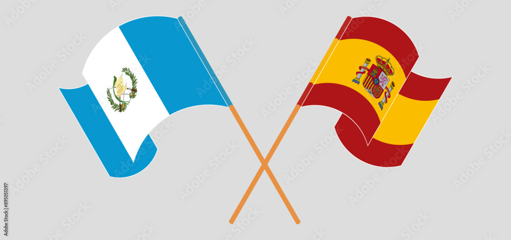 Crossed and waving flags of Republic of Guatemala and Spain Crossed and waving flags of Republic of Guatemala and Spain