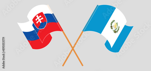 Photography Crossed and waving flags of Slovakia and Republic of Guatemala