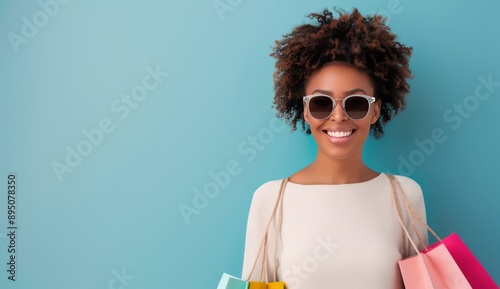 Smiling Woman Holding Shopping Bags