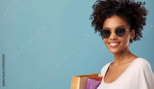 Smiling Woman Holding Shopping Bags