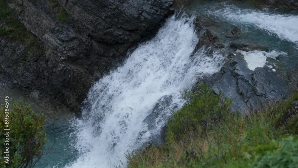 Majestic Waterfall Cascades Down Rocky Cliffs in New Zealand Majestic Waterfall Cascades Down Rocky Cliffs in New Zealand