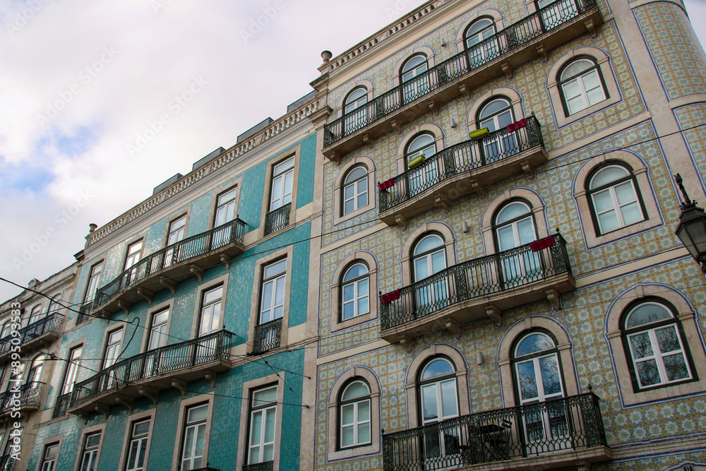 Fototapeta premium Typical colorful buildings in the center of Lisbon. Portuguese architecture in pombaline style.