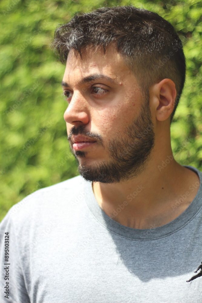 Young Tattooed Man in Sporting Clothes in the City of Zurich on a Sunny Day Young Tattooed Man in Sporting Clothes in the City of Zurich on a Sunny Day